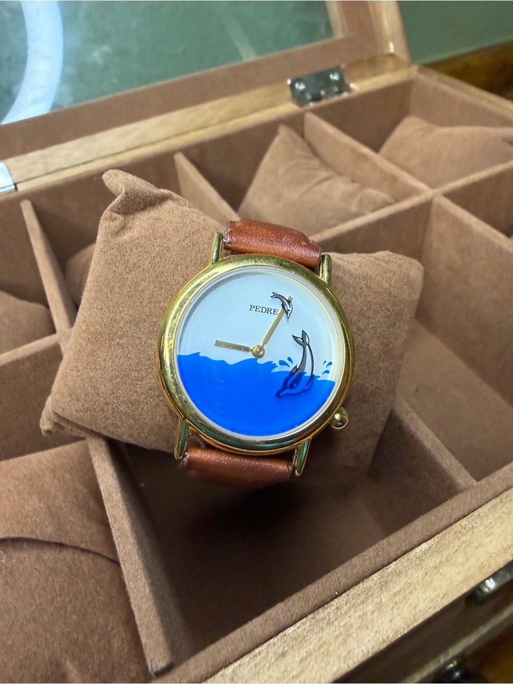 Women's Gold-Tone Watch with Blue Dial and Brown Leather Strap